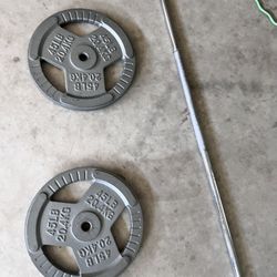 84 inch  Barbell and and two 1 inch 45 pound plates