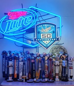TAP HANDLES  MASSIVE INVENTORY. ( ALSO PLENTY OF NEON SIGNS / LIGHTS AVAILABLE FOR SALE ) DODGERS & ANGELS BOBBLEHEADS AVAILABLE. 