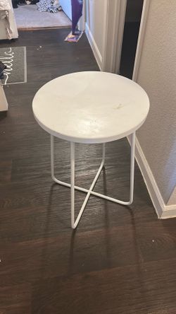 White bedside table