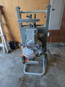 10" Rigid miter saw and portable stand.