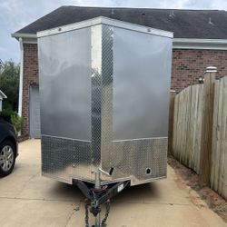 Silver Mist Tandem 6×12 Cargo Trailer A New 6×12 Enclosed Trailer Standard Features Include: 1.) V-Nose Front (Extra Space) With Solid Wall Constructi