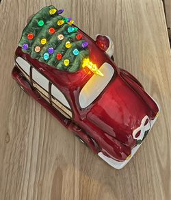 Ceramic Santa Driving W/ A Christmas Tree On Top