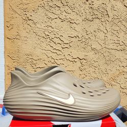 Nike Size 10 Reactx Rejuven8 khaki color