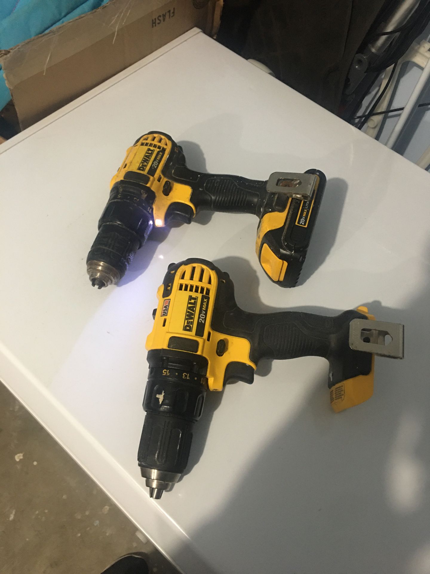 2 Dewalt drills 20v one Brand new and another one usde com with one battery