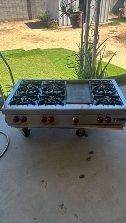 WOLF Gourmet 6 burner with griddle .