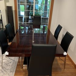 Dining table and 6 leather chairs- Dania Furniture