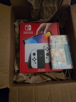 Nintendo Switch Oled with Mario Kart 8 Deluxe