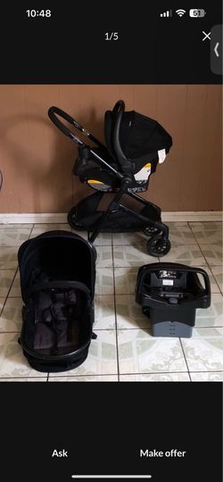 LIKE NEW EVENFLO PIVOT MODULAR TRAVEL SYSTEM STROLLER CAR SEAT AND BASSINET 3 IN 1