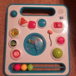 Baby Toy Attaches To Playpen With Holes