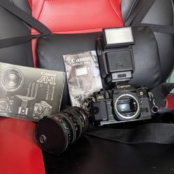 Canon A-1 Camera w/ Manuals, Lens, & Flash