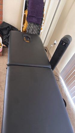 Massage table