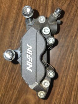 Nissin Motorcycle Brake Caliper with Pads