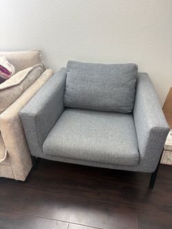 2 Gray Fabric Accent Chairs with Black Metal Legs