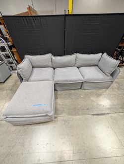 Plush Light Grey Modular Sofa and Ottoman Set