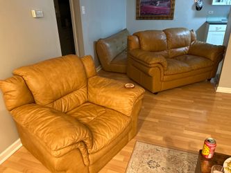 Sofa and armchair in caramel-tan leather