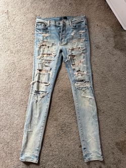 Amiri MX1 Light Wash Distressed Jeans