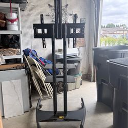 Rolling TV stand on wheels