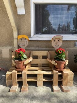 Two Man Plant Holder