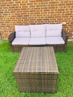 Like new outdoor couch with storage table