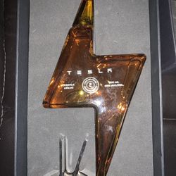 TESLA Tequila bottle With stand NEW Never Opened, Matching Shot Glasses