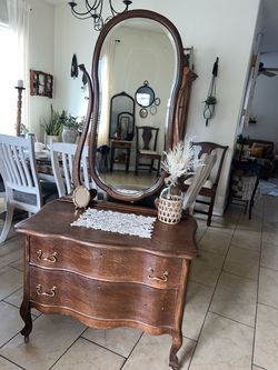 Antique chest of drawers dresser with swivel mirror wheels on the bottom beautiful nice sturdy vintage furniture