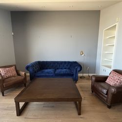 Coffee Table And Blue Couch 