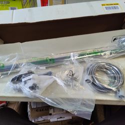 Delta 56302 Shower Grab. Ar With Sliding Showerhead Bar And Hose In Chrome