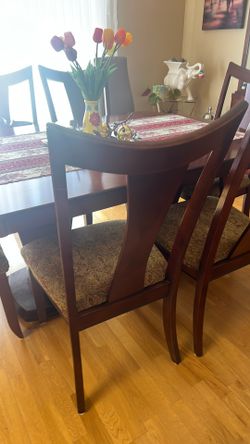 Dinner table and six chair and we have a gifted purchase