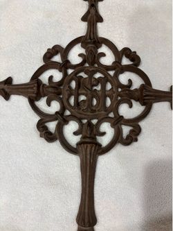 Cast iron filigree design cross