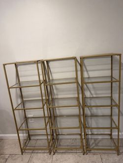 3 gold 5 tier shelves