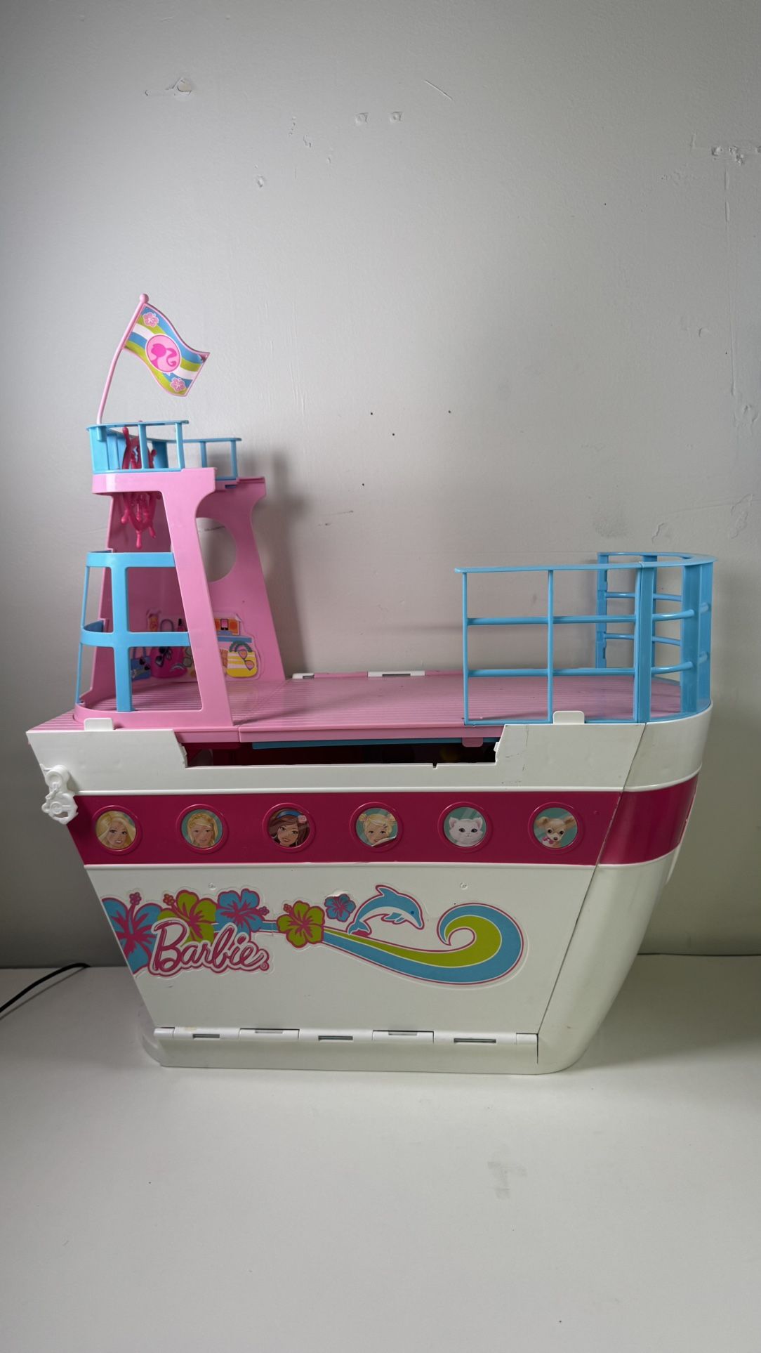 Barbie Yacht $10 the back door is missing other than that. It’s in great condition.