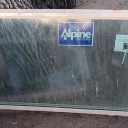 Two brand new alpine windows