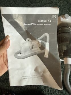 Pet vacuum/groomer
