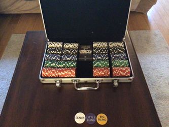 Texas hold’em poker set in case with cards, chips, and