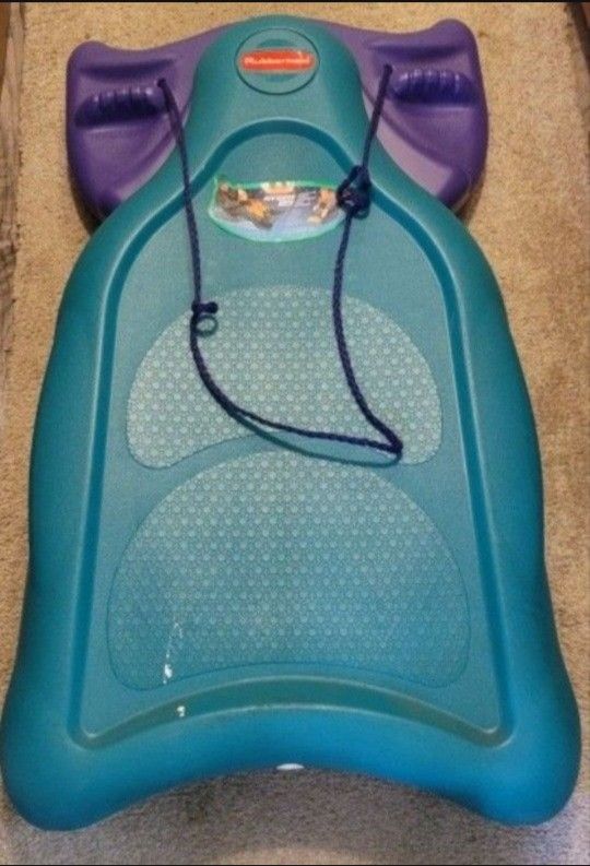 Rubbermaid steerable sled. Condition is new. VINTAGE Rubbermaid Icy Rider Steerable Toboggan Snow Sled Teal Purple.