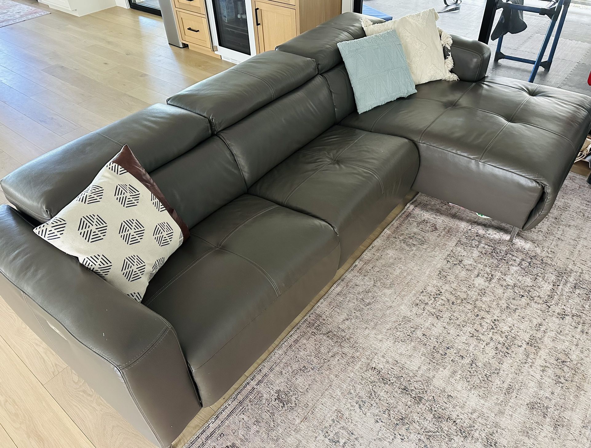 Leather sectional with Side Recliner 