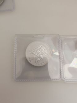 1/2 komsko 1/4 Geiger and circ $1 silver
