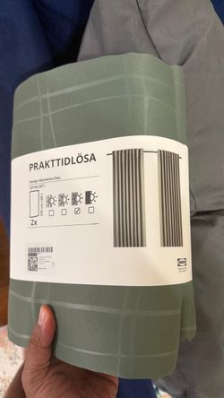 Room darkening curtain