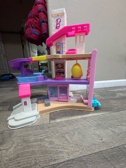 Fisher-Price Little People BarbieĀ® DreamHouse Playset with 4 Vehicles & 6 Figures