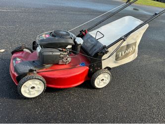 Toro self-propelled lawnmower with a bag