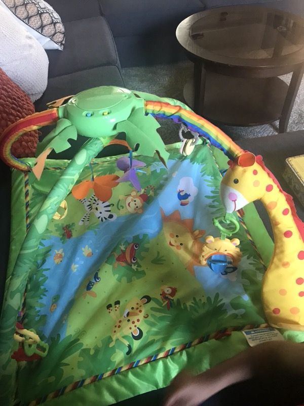 Baby gym / Playmat with hanging toys - New Condition