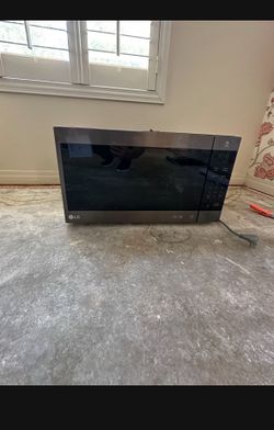 Modern LG Microwave - Sleek Black Stainless Steel - Works Great!