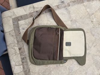 Tumi tech cross body bag