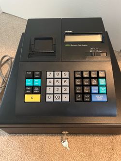 Royal cash register 210DX with 45 rolls of paper