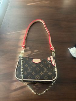 Louis Vuitton clutch purse