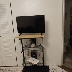 3 tier entertainment shelves.