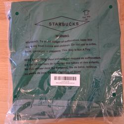 Starbucks official M apron. Brand new in package.