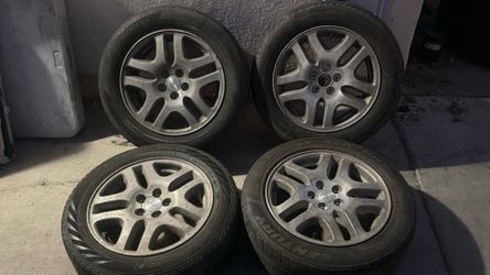 Subaru 16 Inch aluminum wheels with old tires 5x100mm Outback forester legacy