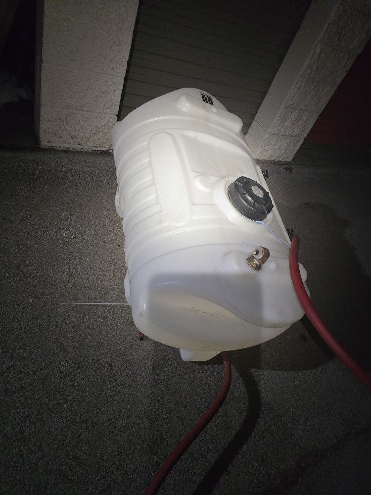 60 Gallon Liquid Storage Tank With Lid And Inlet And Outlet Ports On Bottom With Hoses