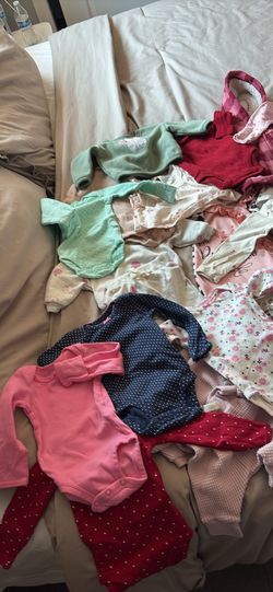 Bag of babygirl clothes